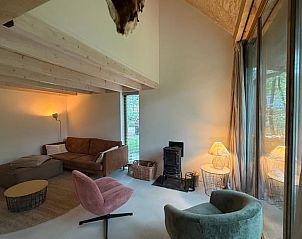 Spacious living room in Holiday home in Lochem, Achterhoek, Gelderland, with comfortable seating.