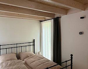 Comfortable bedroom in Holiday home in Lochem, Achterhoek, Gelderland, with wooden beams.