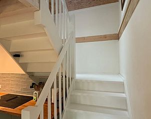 Stairs to upper floor in Holiday home in Lochem, Achterhoek, Gelderland, with wooden finish.
