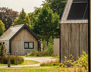 Rustiek vakantiehuis Unbrick One in Hengelo, Achterhoek, omgeven door groene natuur in Gelderland.