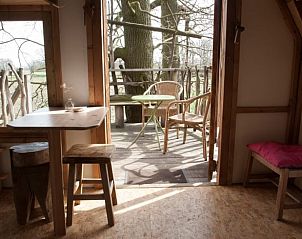 Eethoek met terraszicht in Huisje in Haarlo, vakantiewoning in Achterhoek, Gelderland.