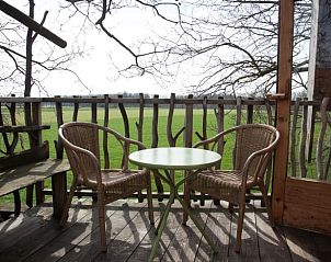 Rustig terras met uitzicht bij Huisje in Haarlo, vakantiewoning in Achterhoek, Gelderland.