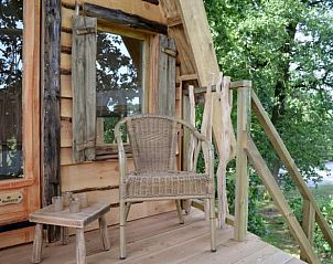 Veranda met stoel bij Huisje in Haarlo, vakantiehuis in Achterhoek, Gelderland.