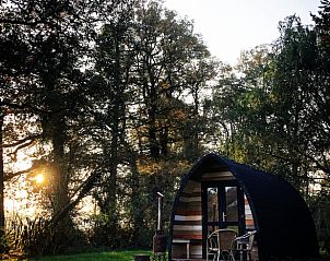 Sfeervol vakantiehuis Huisje in Haarlo bij zonsondergang, gelegen in Haarlo, Achterhoek, Gelderland.