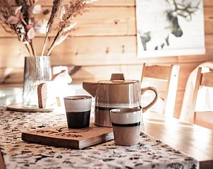 Gezellige eetruimte in Vakantiehuisje in Haarlo, perfect voor een verblijf in de Achterhoek, Gelderland.