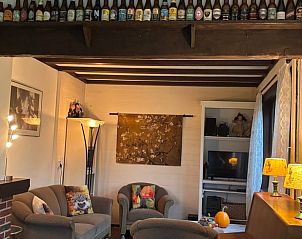 Uitzicht op groene velden vanuit Vakantiehuis in Wichmond, een oase van rust in Gelderland.