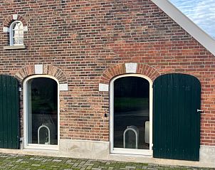 Gemtlicher Innenraum des Ferienhauses in Geesteren, Ferienhaus in der Region Achterhoek, Gelderland. Authentische Holzbalken und moderne Kche.