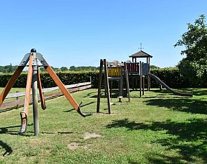 Playground with various equipment at Holiday home in Vorden, ideal for children in Achterhoek, Gelderland.