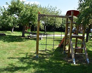 Climbing frame in the garden of Holiday home in Vorden, child-friendly vacation home in Achterhoek, Gelderland.