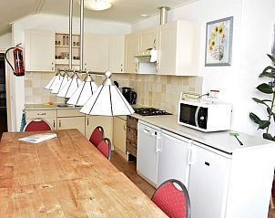 Kitchen in Holiday Home in Vorden, fully equipped for a comfortable stay in the Achterhoek, Gelderland.
