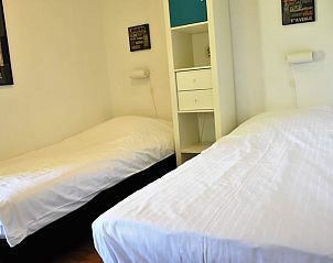 Cozy bedroom with two single beds in Holiday home in Vorden, Achterhoek, Gelderland.