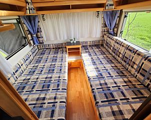 Gezellige slaapkamer in Vakantiehuis in Lichtenvoorde, Achterhoek, Gelderland, biedt ontspanning na een dag verkennen.