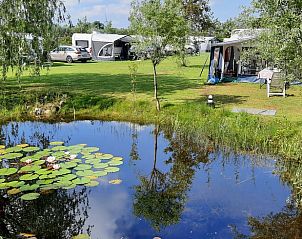 Idyllische vijver bij Camping de Kei, Achterhoek, biedt rust nabij Vakantiehuis in Lichtenvoorde, Gelderland.