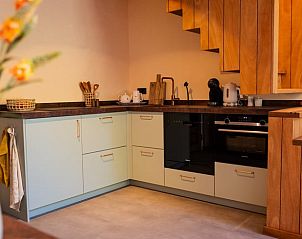 Moderne keuken in Vakantiehuisje in Neede, Achterhoek, voorzien van alle gemakken voor een fijn verblijf.
