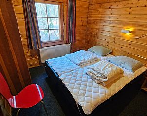 Knusse slaapkamer in Huisje in Neede, Achterhoek, met tweepersoonsbed.