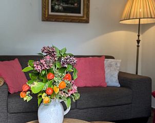 Comfortabele zithoek in Vakantiehuisje in Neede, perfect voor ontspanning