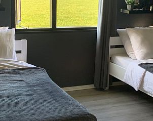 Tweepersoons slaapkamer in Vakantiehuisje in Winterswijk Miste met uitzicht op de natuur, Achterhoek, Gelderland.