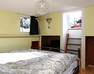 Slaapkamer in Vakantiehuis in Almen, comfortabele ruimte in de Achterhoek, Gelderland voor een goede nachtrust.