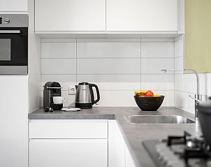 Slaapkamer met tweepersoonsbed in De Vlinderhoeve, Achterhoek, Gelderland.