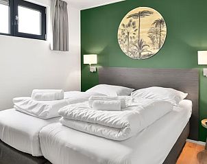 Tweede slaapkamer met tweepersoonsbed in De Vlinderhoeve, Achterhoek.