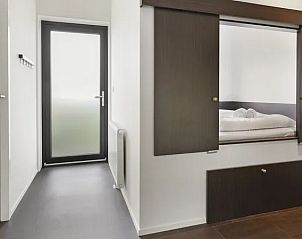 Slaaphoek in De Vlinderhoeve bungalow, knusse ruimte voor extra gasten in Gelderland.