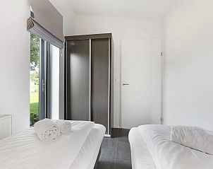 Ruime tuin rondom De Vlinderhoeve vakantiehuis, ideaal voor buitenactiviteiten in Gelderland.