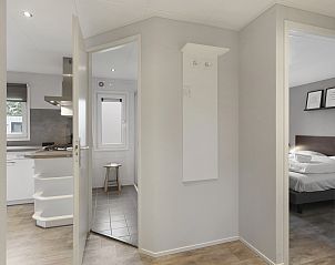 Toegang tot slaapkamer en keuken in De Vlinderhoeve, vakantiehuis in Kring van Dorth, Gelderland.