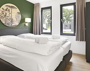 Comfortabele slaapkamer in De Vlinderhoeve 6-persoonsbungalow in Kring van Dorth, Gelderland.