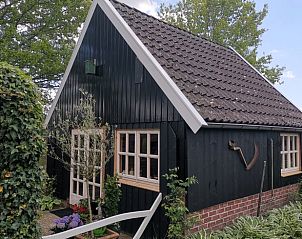 Charmant Vakantiehuisje in Winterswijk Corle, gelegen in de groene Achterhoek, Gelderland, met rustieke tuin en landelijke uitstraling.