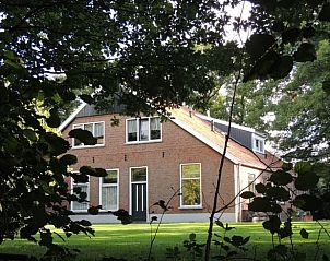 Vooraanzicht van Vakantiehuis in Winterswijk Corle, omgeven door natuur in Achterhoek, Gelderland.