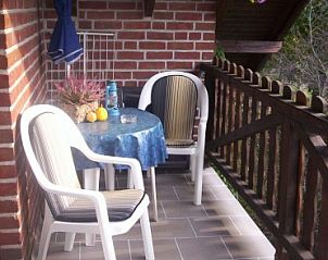 Knus balkon met zitje in de vakantiewoning te Beek-Montferland, Montferland, Gelderland.