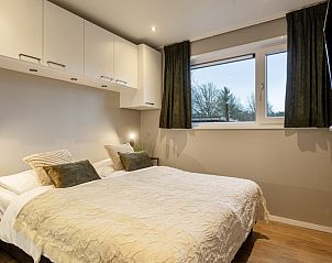 Gemtliches Schlafzimmer im Ferienhaus Belverdere fr 6 Personen in Beekbergen, Veluwe, mit Blick auf die Natur von Gelderland.