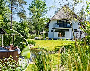Villa fr 8 Personen Wellness in Beekbergen, Veluwe, Gelderland mit Whirlpool und grnem Garten, perfektes Ferienhaus fr Entspannung in der Natur.