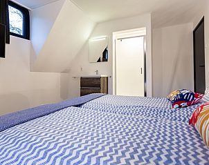 Gemtliches Schlafzimmer in der Villa 8 Personen Wellness in Beekbergen, Veluwe. Genieen Sie Komfort und Ruhe in diesem gerumigen Ferienhaus in Gelderland.