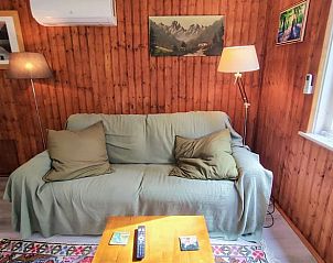 Gemtliches Wohnzimmer im Ferienhaus in Beekbergen, Veluwe, ideal fr entspannte Abende.