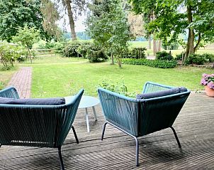 Beautiful view from the terrace of Holiday home in Beekbergen, Veluwe, surrounded by nature in Gelderland.