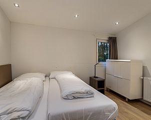 Gemtliches Schlafzimmer in der Veluwe Lodge fr 4 Personen, Ferienhaus in Beekbergen, Veluwe. Genieen Sie die Ruhe und Natur in Gelderland.