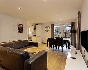 Gemtlicher Innenbereich der Veluwe Lodge fr 4 Personen in Beekbergen, Veluwe. Komfortables Ferienhaus mit moderner Kche und grozgiger Sitzecke.