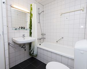 Sfeervolle open haard in Heideheuvel 4C2 bungalow, Beekbergen, Veluwe.