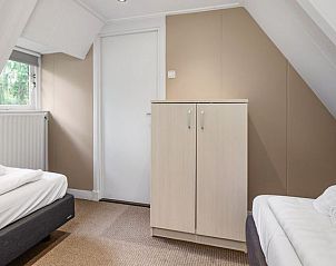 Tweede slaapkamer met eenpersoonsbedden in Heideheuvel bungalow 4L1, Beekbergen.