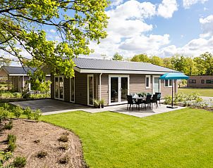 Leijhoeve Ferienhaus fr 6 Personen mit Terrasse in Beekbergen, Veluwe, Gelderland, umgeben von grner Natur und einer ruhigen Umgebung.
