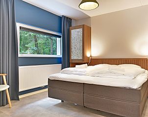 Ruime zithoek in de Heideheuvel bungalow, ideaal voor groepen in Beekbergen, Veluwe.