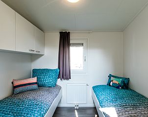 Gemtliches Schlafzimmer im Ferienhaus Rialto fr 6 Personen in Beekbergen, Veluwe, mit bequemen Betten und viel Tageslicht.