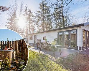 Geniet van de Parel 5 personen Wellness met hottub in Ede, Veluwe. Ontspan op het terras van dit vakantiehuis omgeven door natuur.