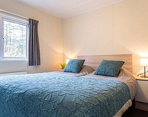 Gemtliches Schlafzimmer im Ferienhaus fr 5 Personen, Ede, Veluwe, Gelderland mit Blick auf die Natur.