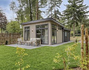 Heidehof 5 personen vakantiehuis in Ede, Veluwe met moderne buitenruimte en groene omgeving.