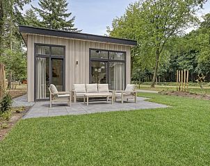 Heidehof 5 personen vakantiehuis in Ede, Veluwe, met prachtig uitzicht op het omliggende groen.