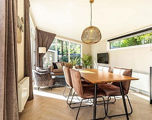 Dining room and sitting area of Silva 4 persons Wellness vacation home in Ede, Veluwe.