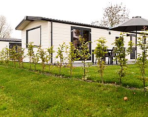 Exterieur van Luna vakantiewoning, Ede, Veluwe, met terras en tuin.