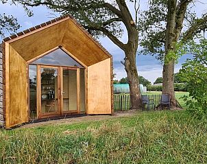 Charmant vakantiehuisje in Ede, Veluwe, omringd door natuur en rust.